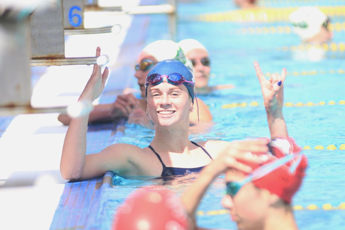 Harvey was all smiles after a winning race vs. Canyon Crest in a dual meet earlier this season.