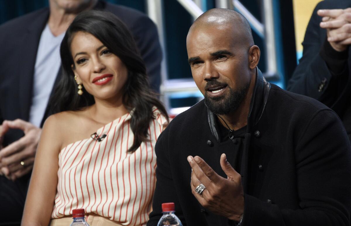 Stephanie Sigman and Shemar Moore