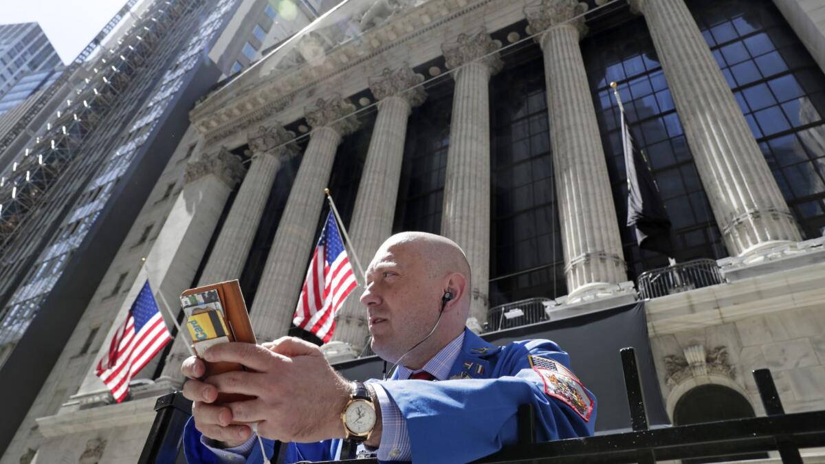 Vincent Pepe enjoys some fresh air last month outside the New York Stock Exchange where he works.