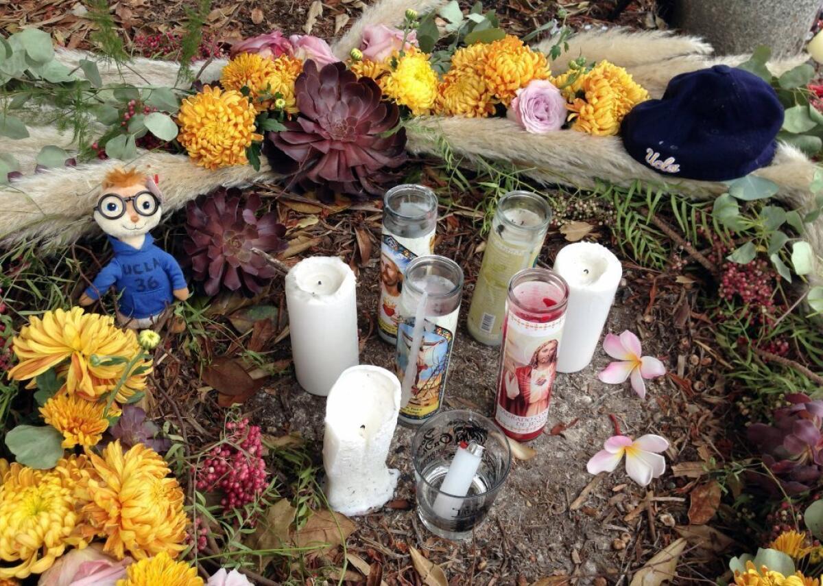 A roadside memorial to UCLA football player Nick Pasquale is seen near where he was struck and killed by a car on Camino De Los Mares in San Clemente.