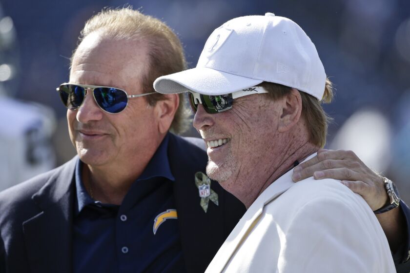 Chargers President Dean Spanos, left, and Raiders owner Mark Davis could learn of their relocation fates as early as next week.