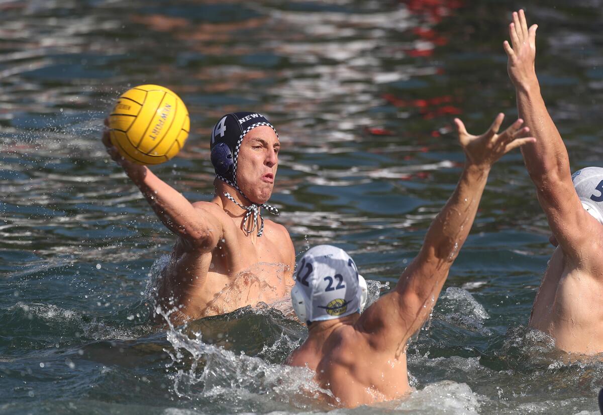 Newport Harbor's Connor Ohl fires in a goal during the Battle in the Bay showcase against Corona del Mar.