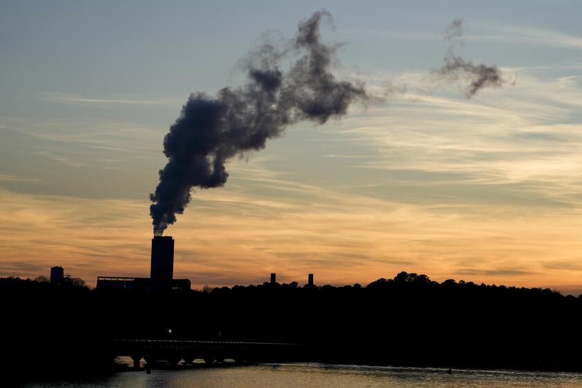 FILE - The Marshall Steam Station coal power plant operates March 3, 2024, near Mooresville, N.C. A rule issued April 24, 2024, by the Environmental Protection Agency would force power plants fueled by coal or natural to capture smokestack emissions or shut down. (AP Photo/Chris Carlson, File)