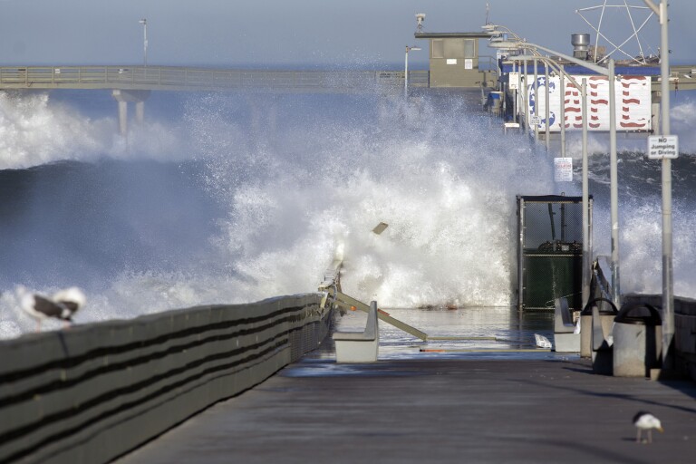 Big waves batter San Diego County coast; even warmer weather on tap