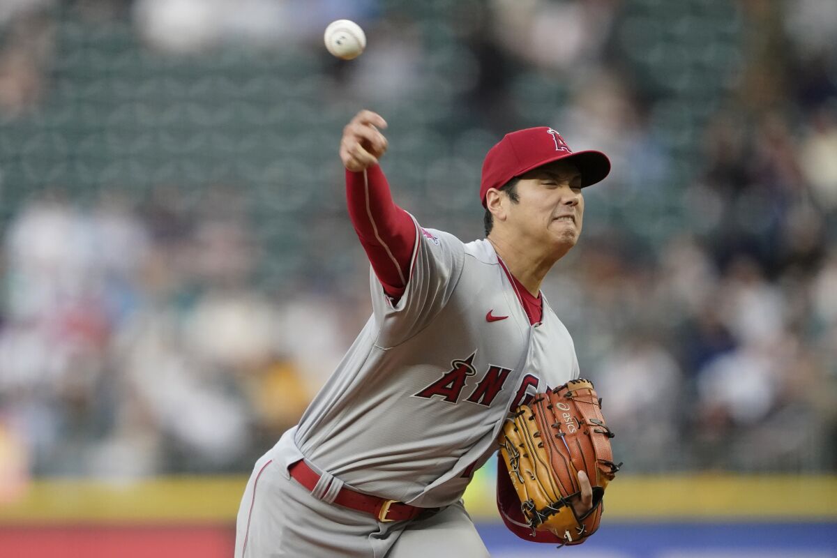 Angels' Shohei Ohtani throws against the Seattle Mariners.
