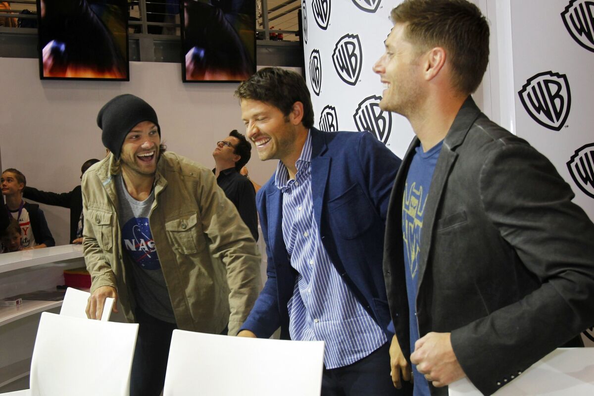 Actors Jared Padalecki, Misha Collins and Jensen Ackles of the television show "Supernatural" signed autographs at Comic-Con.