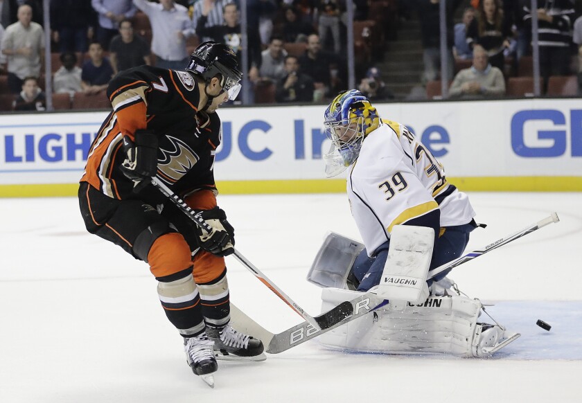 Ducks forward Andrew Cogliano (7) shoots the puck past Nashville Predators goalie Marek Mazanec (39) for a goal during the second period on Oct. 26.