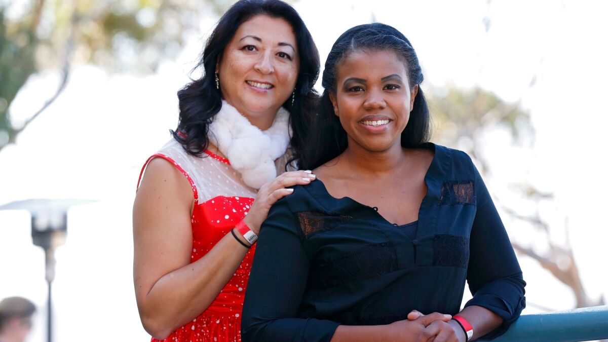 Foster Youth Mentor Peggy Goldsmith with her longtime mentee Andreia Dooley, 27, who Goldsmith began mentoring 20 years ago. Goldsmith has hosted 13 annual Christmas parties for San Diego foster youth.