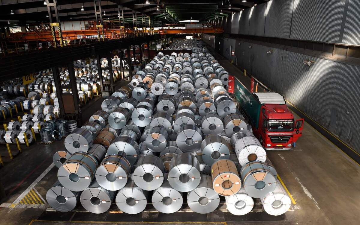 Coils are stored for delivery at the production site of German steel technology group Salzgitter AG in Salzgitter on March 17, 2015.