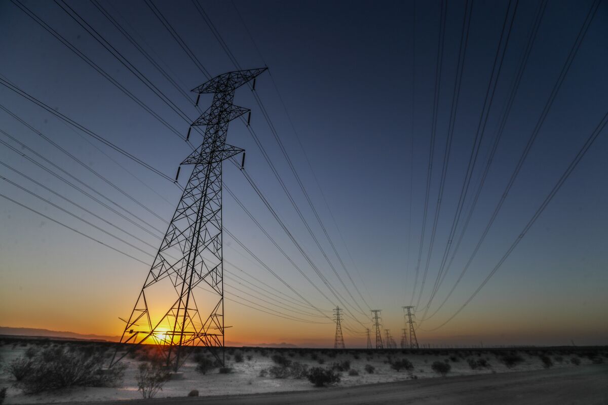 Power lines run through California's Imperial Valley, an agricultural region that also produces growing amounts of solar.