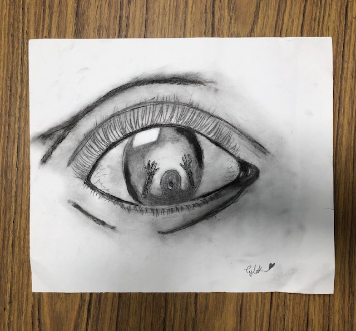 Tyler, 13, said she likes drawing eyeballs.