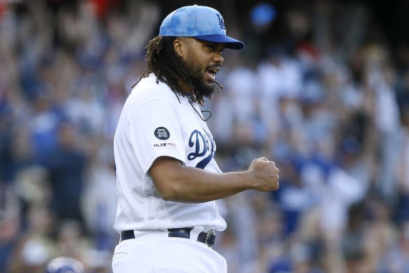 Los Angeles Dodgers relief pitcher Kenley Jansen reacts after the last out by the Chicago Cubs during the ninth inning of a baseball game in Los Angeles, Sunday, June 16, 2019. The Dodgers won 3-2. (AP Photo/Alex Gallardo)