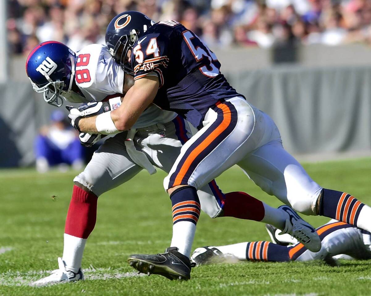 Urlacher started at middle linebacker in Week 3 of his rookie season after Barry Minter was injured. Urlacher, who played on the strong side in the first two weeks, had 13 tackles and a sack versus the Giants at Soldier Field. "I remember the first (practice) they moved 'Lach to middle linebacker," Kreutz said. "His first play, I jumped out to try to block him. He just ran by me like I wasnt even there."