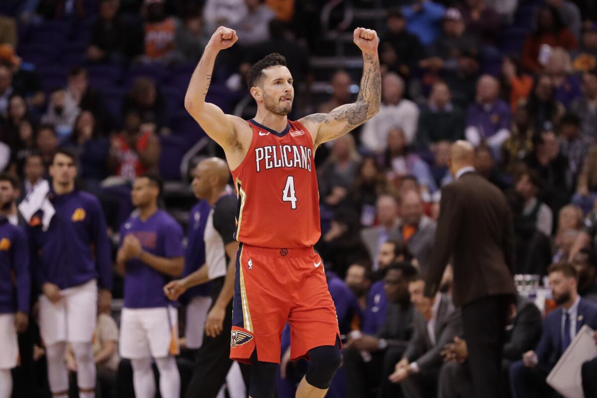 Pelicans guard JJ Redick celebrates a basket during the second half of a game against the Suns on Nov. 21, 2019, in Phoenix.