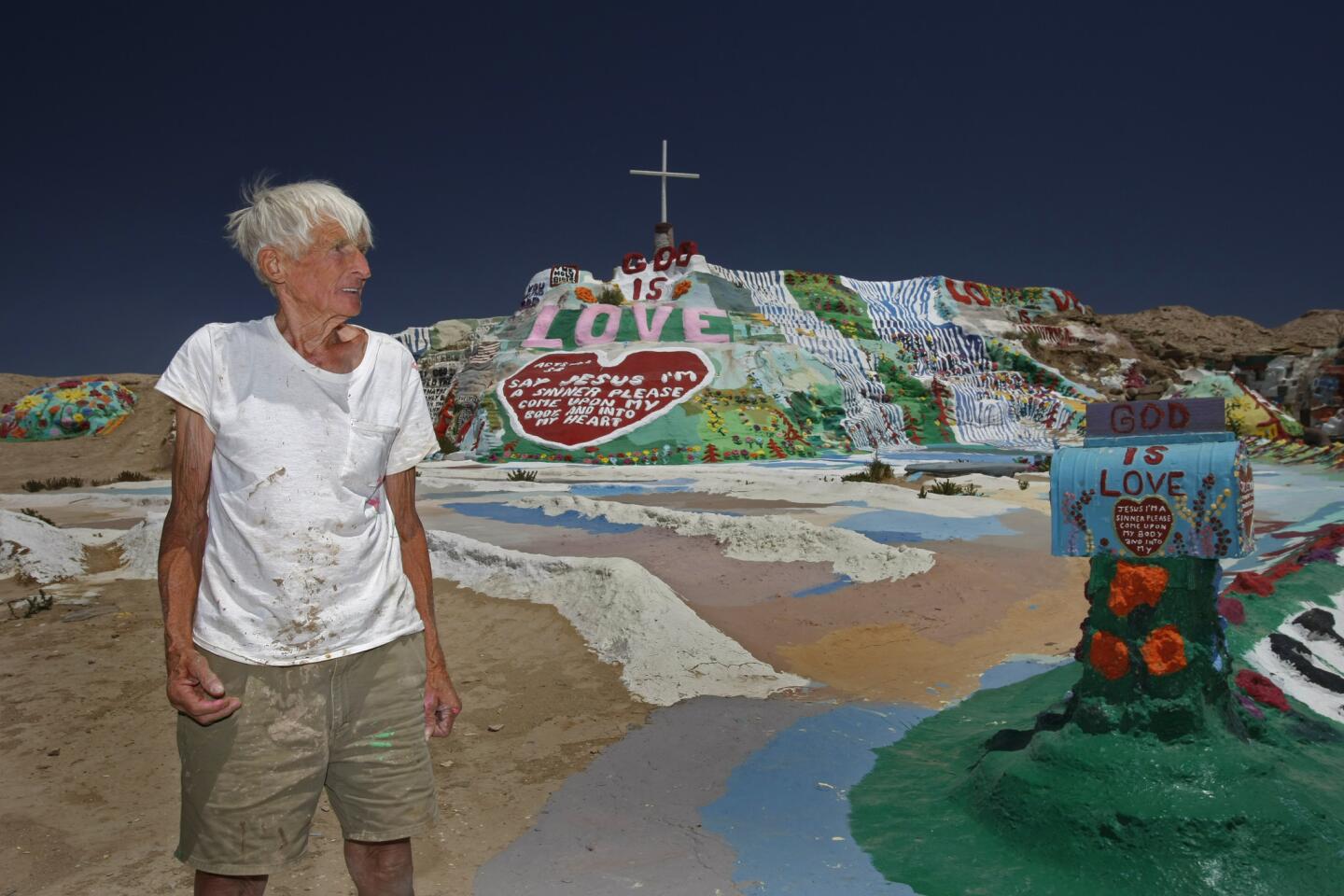 Leonard Knight created Salvation Mountain near the Salton Sea. For decades he slept in his truck, happy to live without lights or running water. "Love Jesus and keep it simple," he said.