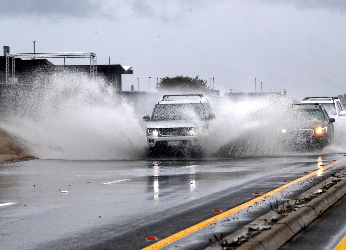 Flooding in low-lying and urban areas may occur as a storm dumps about an inch of rain onto Orange County.