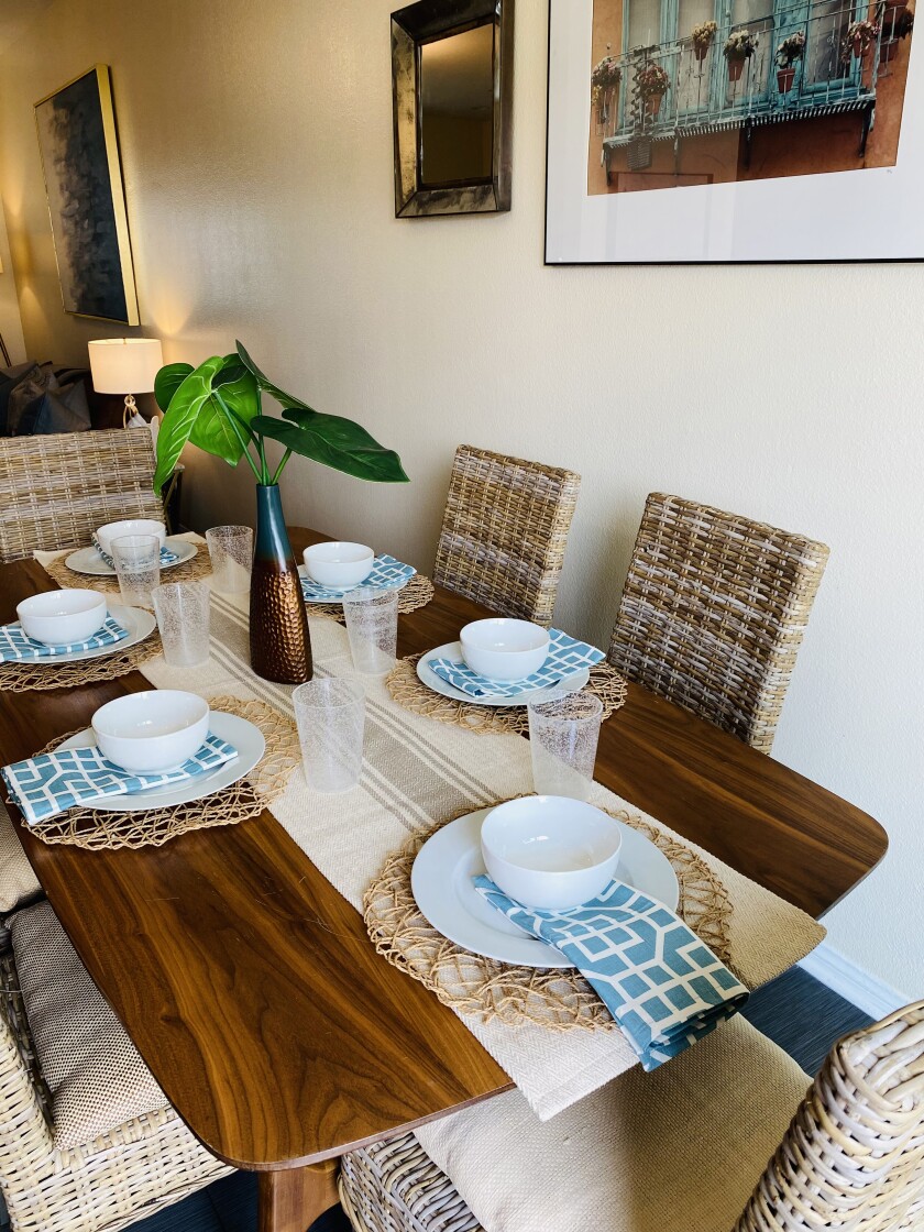 The newly decorated dining room is complete with tableware donations.