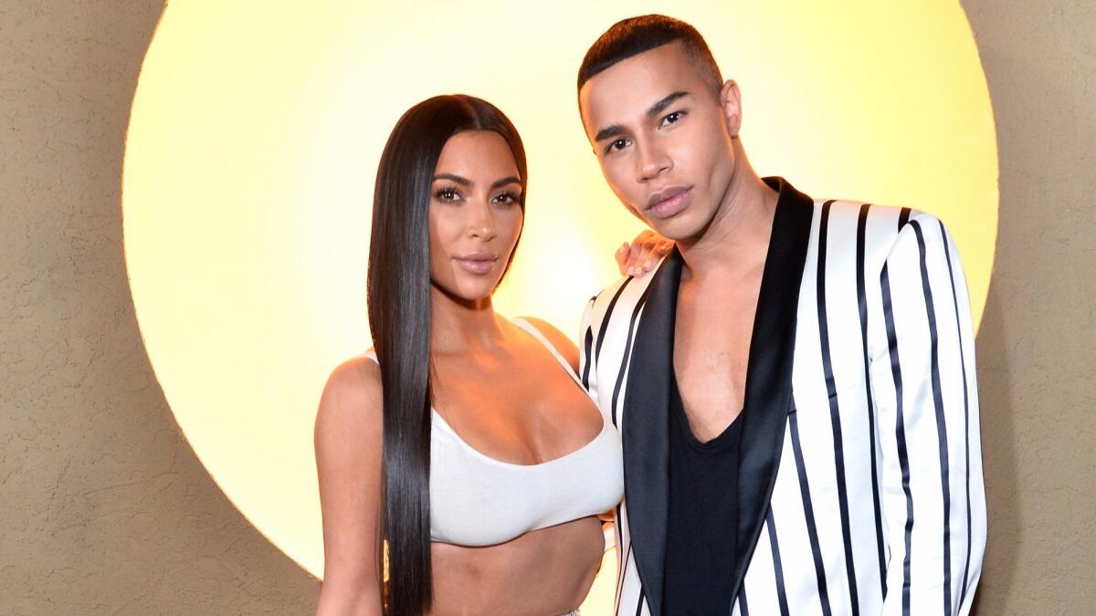 Kim Kardashian West and Olivier Rousteing at at the Balmain and Beats by Dre collaboration party in Beverly Hills. (Stefanie Keenan / Getty Images for Balmain)
