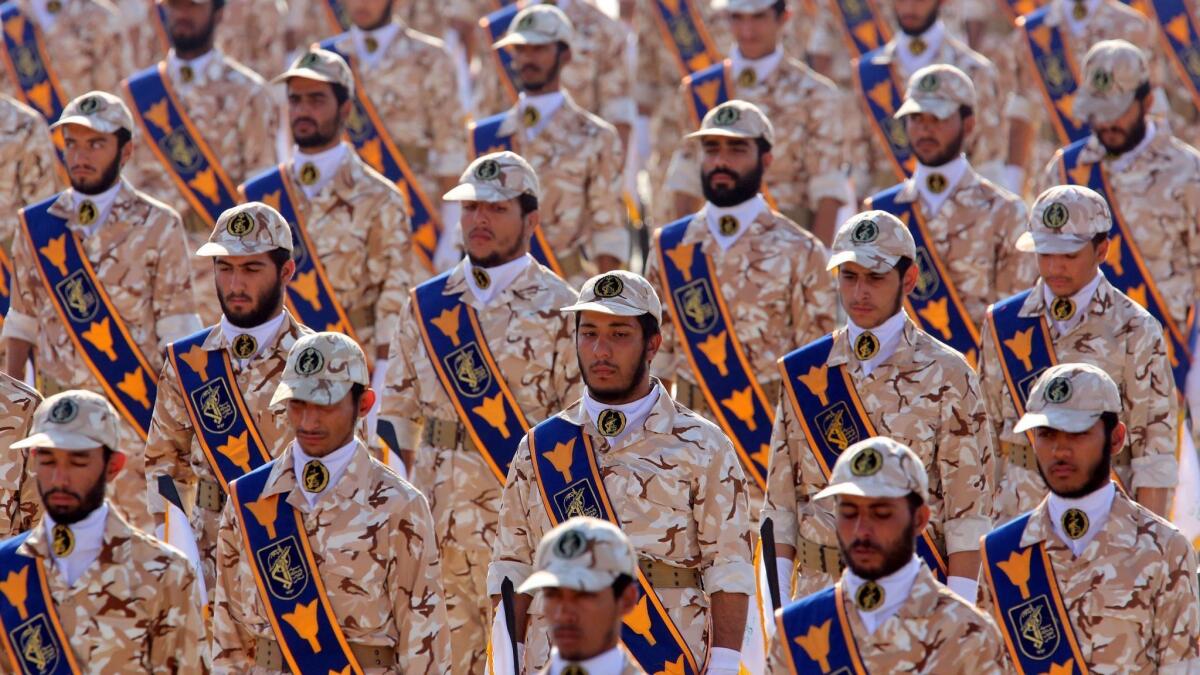 Soldiers in Iran's Islamic Revolutionary Guard Corps march in Tehran during the annual military parade marking the Iraqi invasion in 1980, which led to an eight-year war. President Trump designated the Revolutionary Guard a terrorist organization on April 8, 2019.