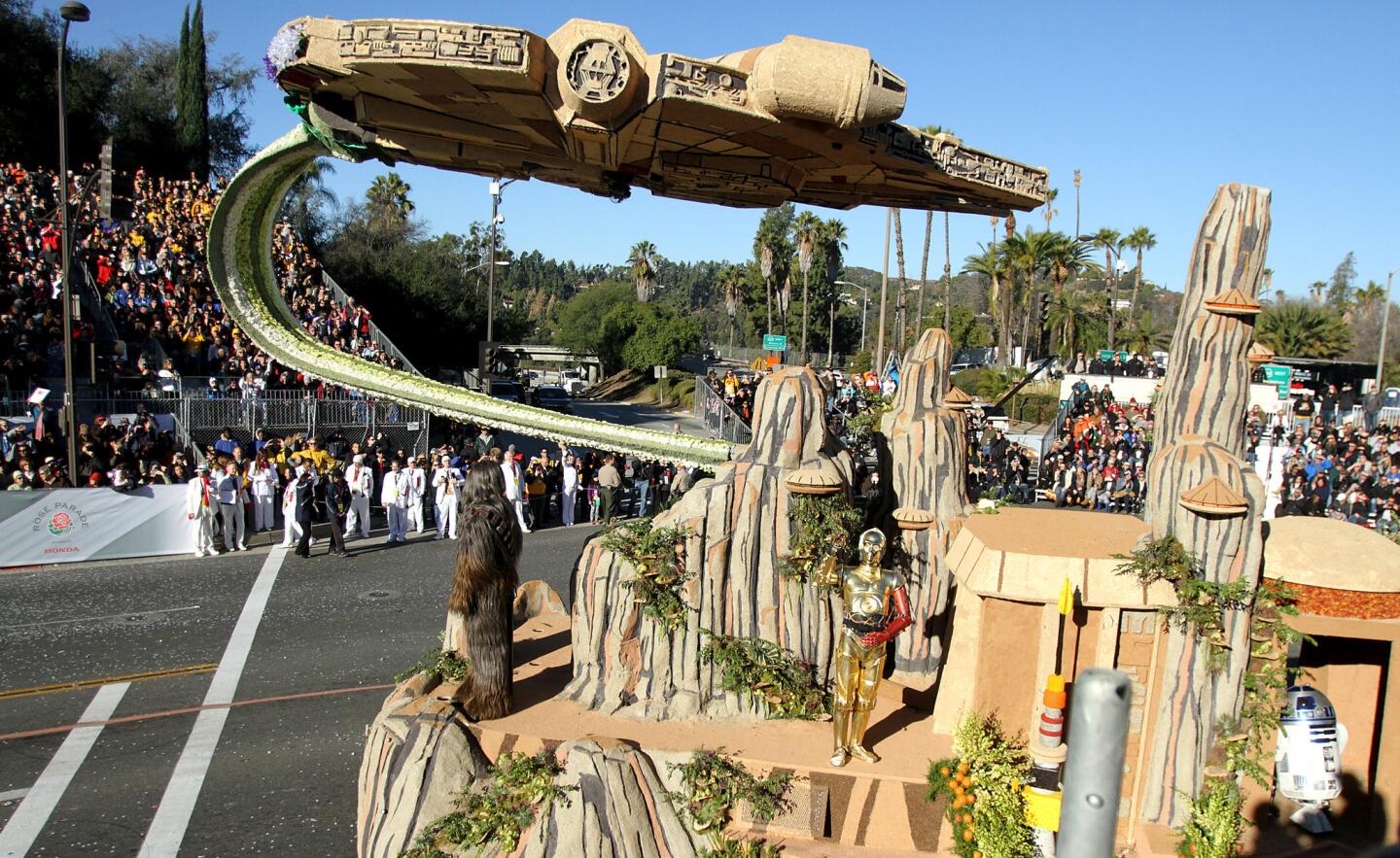 The Disneyland Resort float rolls down Orange Grove Avenue during the 2016 Rose Parade in Pasadena on Friday, Jan. 1, 2016. The three-part float included a section for Frozen, a section for Disneyland Resort and a section for Star Wars.