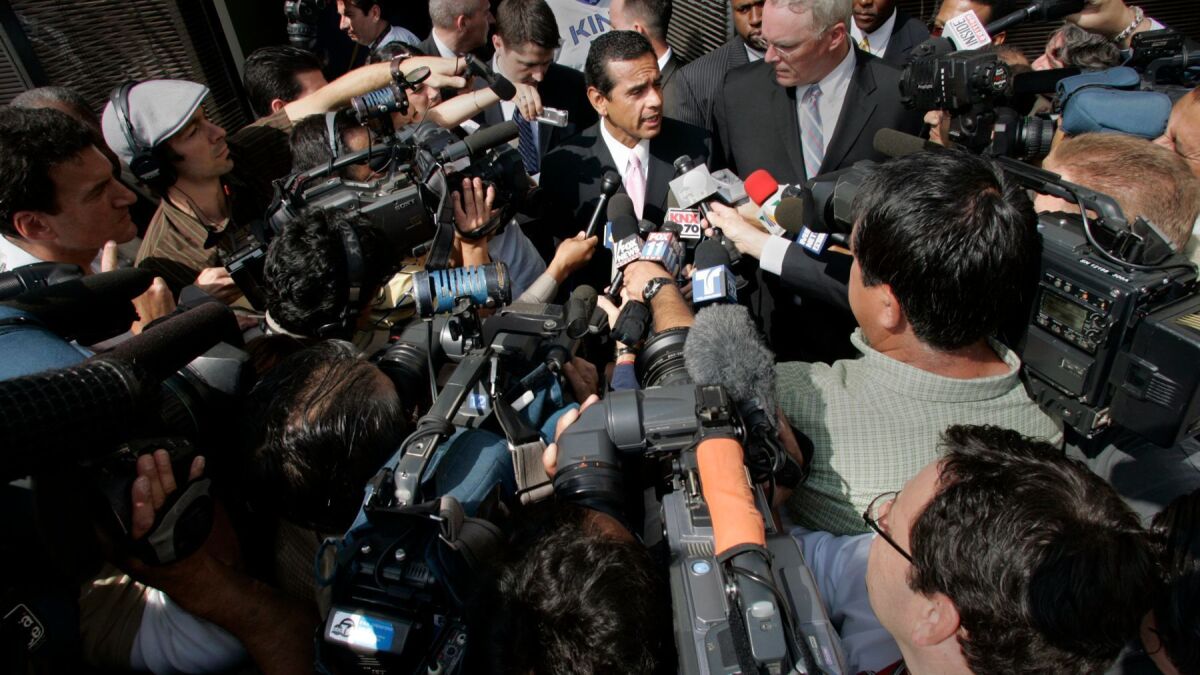 The news media surround Mayor Antonio Villaraigosa in July 2007 after news broke about his affair with a local TV reporter.