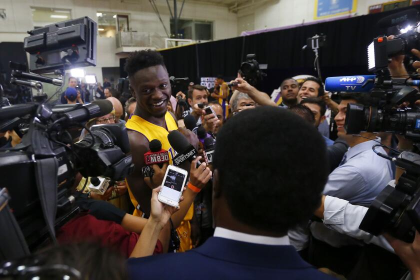 Lakers power forward Julius Randle talks to reporters during the team's media day.