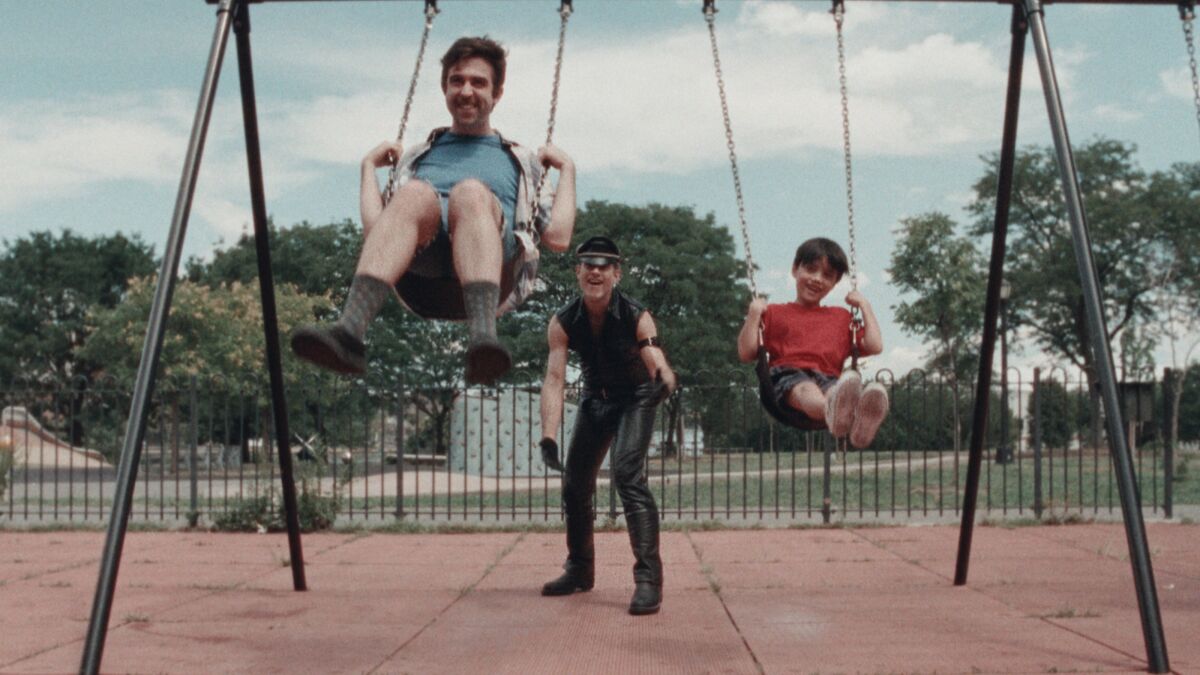 Mark Blane, Christian Patrick and Joseph Seuffert play on a swingset in the movie "Cubby."