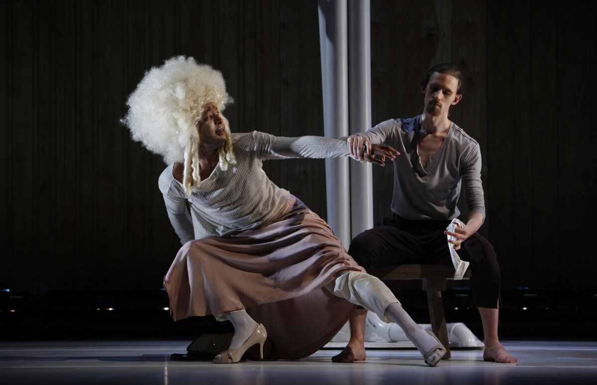 Choreographer Kyle Abraham, left, with Jordan Morley, performs in drag in "Watershed" at UCLA.