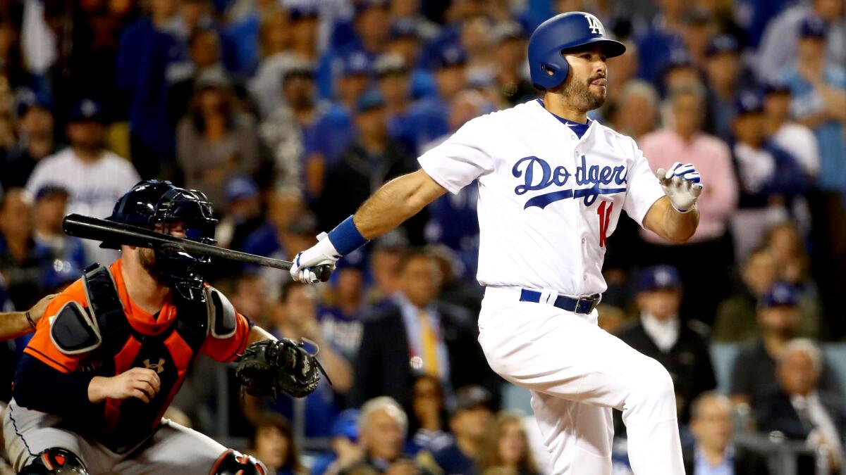 Andre Ethier follows through on a run-scoring single during the sixth inning of Game 7.