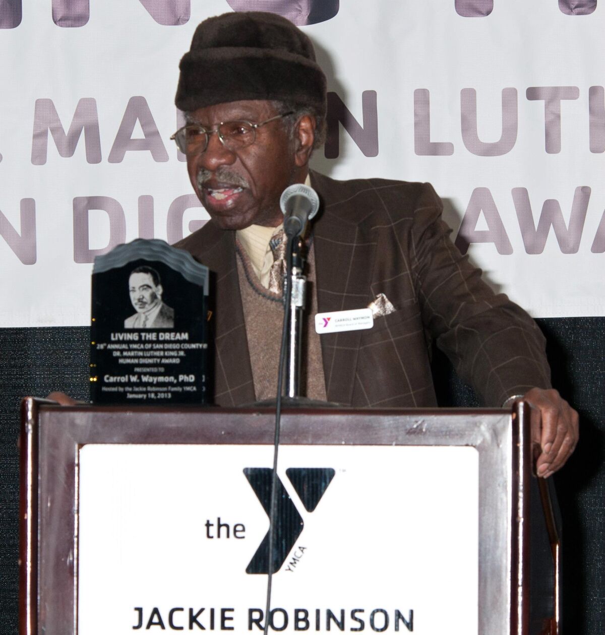 Carrol Waymon, accepting the Human Dignity Award from San Diego's Jackie Robinson YMCA in 2013.