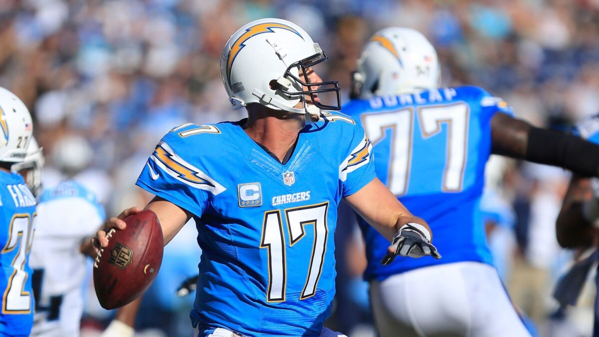 Chargers quarterback Philip Rivers facing-off against the Tennessee Titans on Sunday. The Chargers won and improved to 4-5.