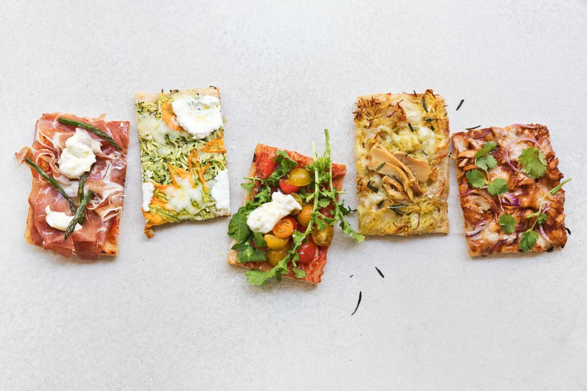 Several square slices of pizza