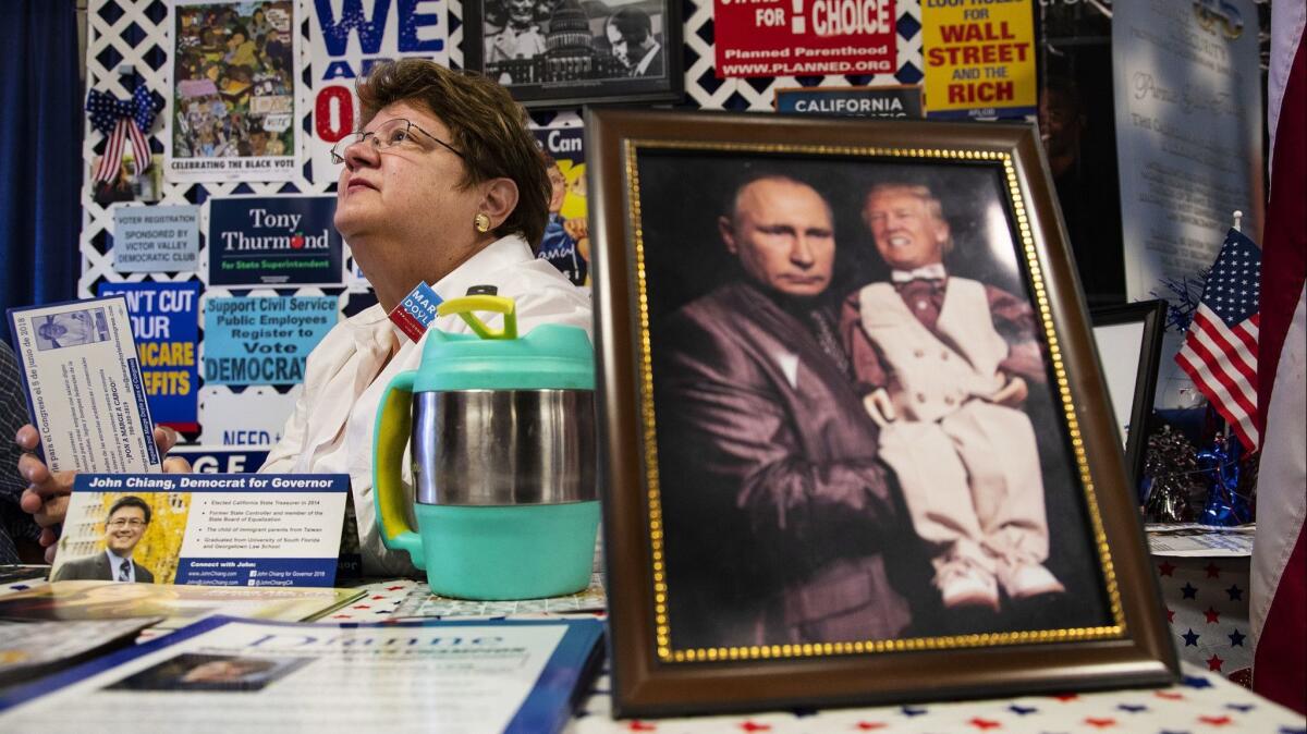 Democratic candidate for Congress Marge Doyle talks with voters who stop by a booth at the San Bernardino County Fair over Memorial Day weekend.