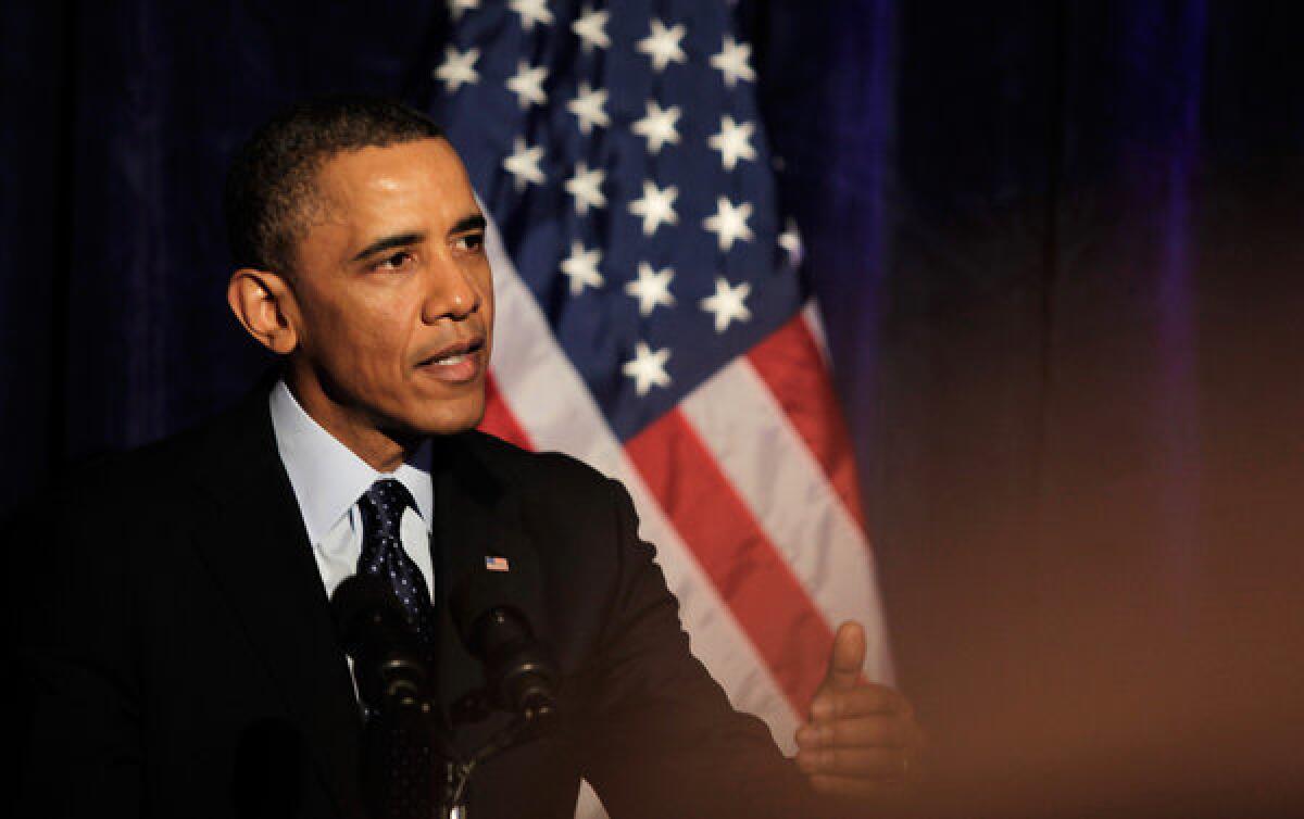 President Obama delivers remarks at the Organizing for Action dinner at the St. Regis Hotel in Washington.