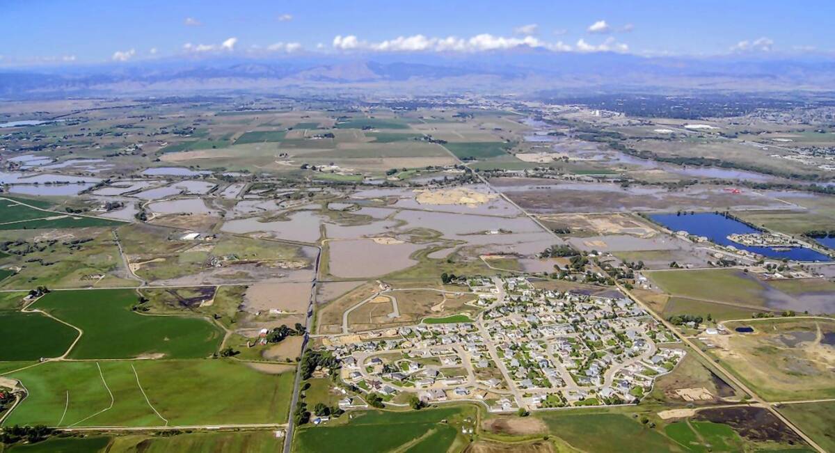 An image captured Tuesday shows flooding in Colorado's Weld County, where two large oil spills have resulted from inundated drilling and storage facilities.