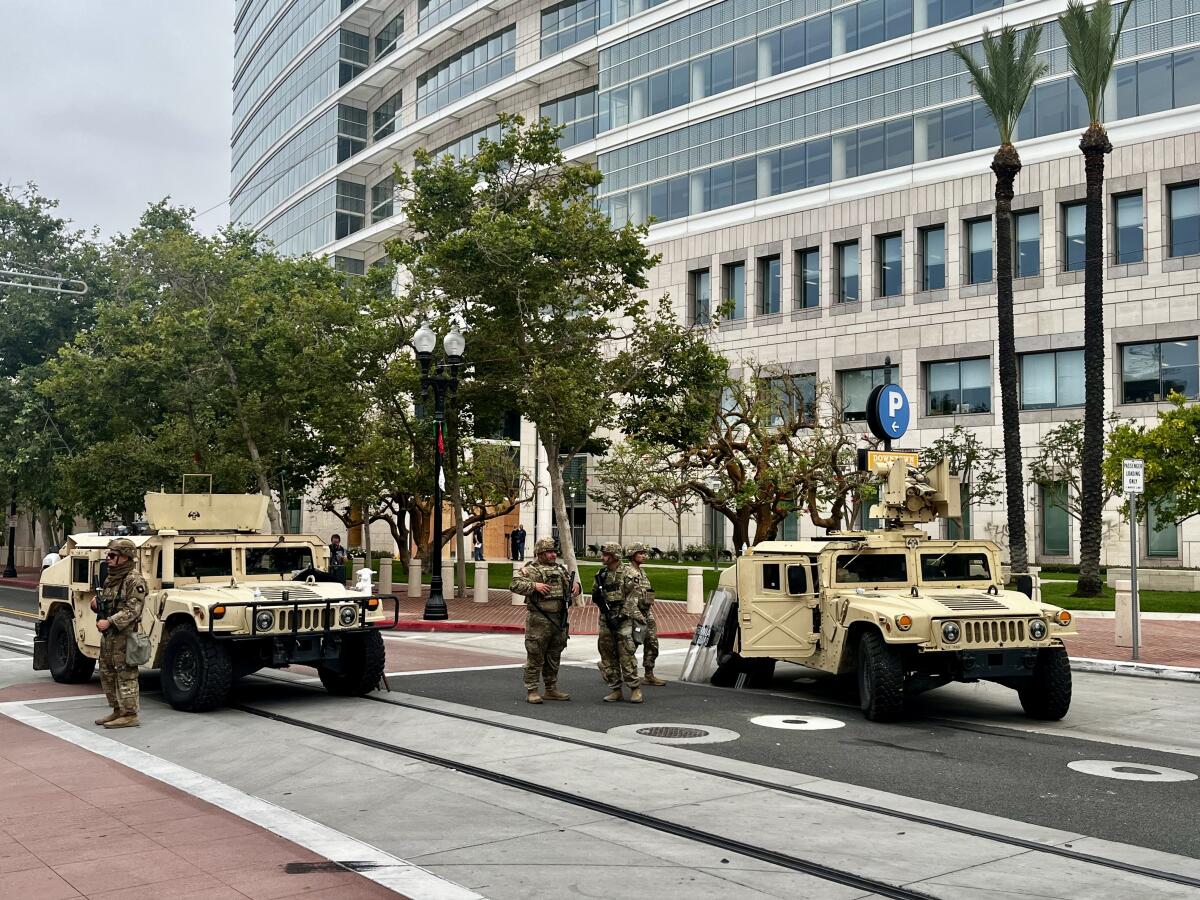 National Guard troops stationed in front of the Ronald Reagan Federal Building and U.S. Courthouse in Santa Ana.