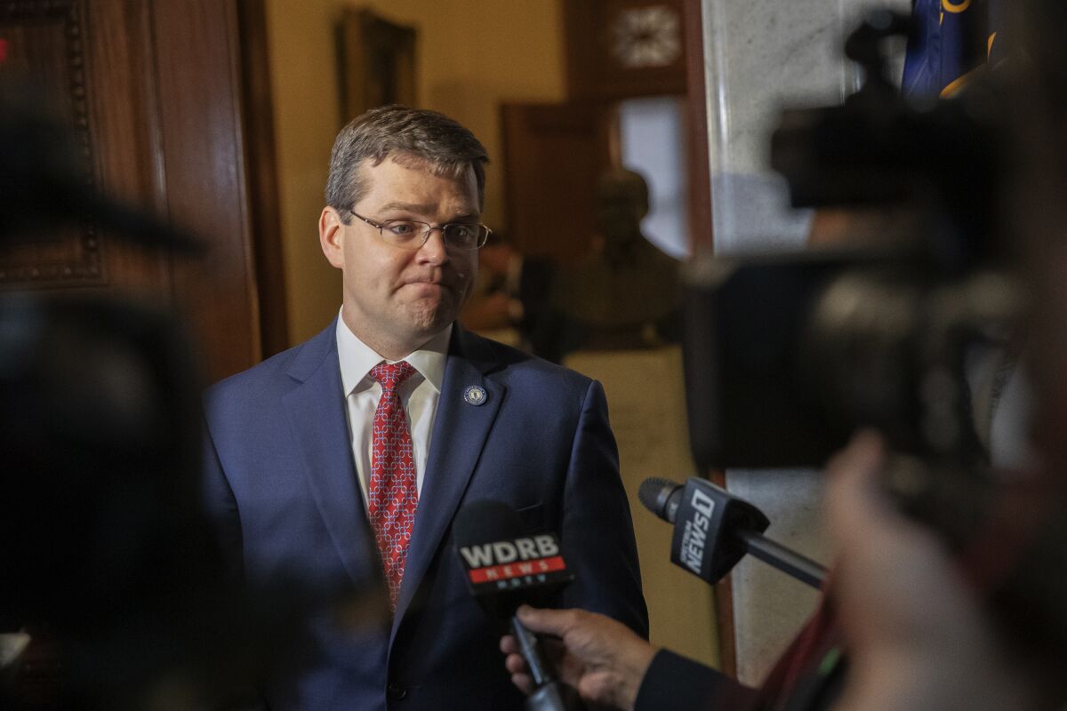 FILE - S. Chad Meredith, Kentucky solicitor general, speaks to members of the media after making arguments before the Kentucky Supreme Court at the state Capitol in Frankfort, Ky., on Thursday, June 10, 2021. On Friday, July 15, 2022, the White House dropped plans to nominate Meredith, an anti-abortion lawyer backed by Senate Republican leader Mitch McConnell, for a federal judgeship in Kentucky. (Ryan C. Hermens/Lexington Herald-Leader via AP, Pool, File)