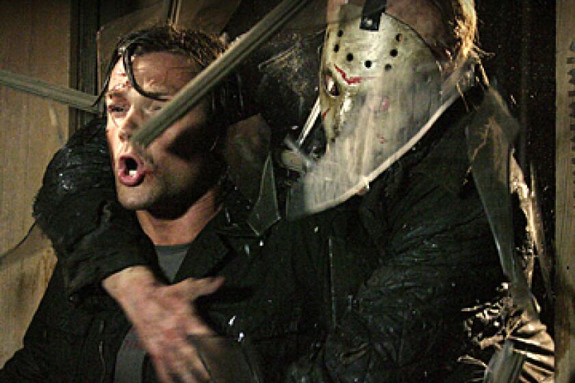 'Friday the 13th': Jason (Derek Mears) crashes through a window and grabs Clay (Jared Padalecki).