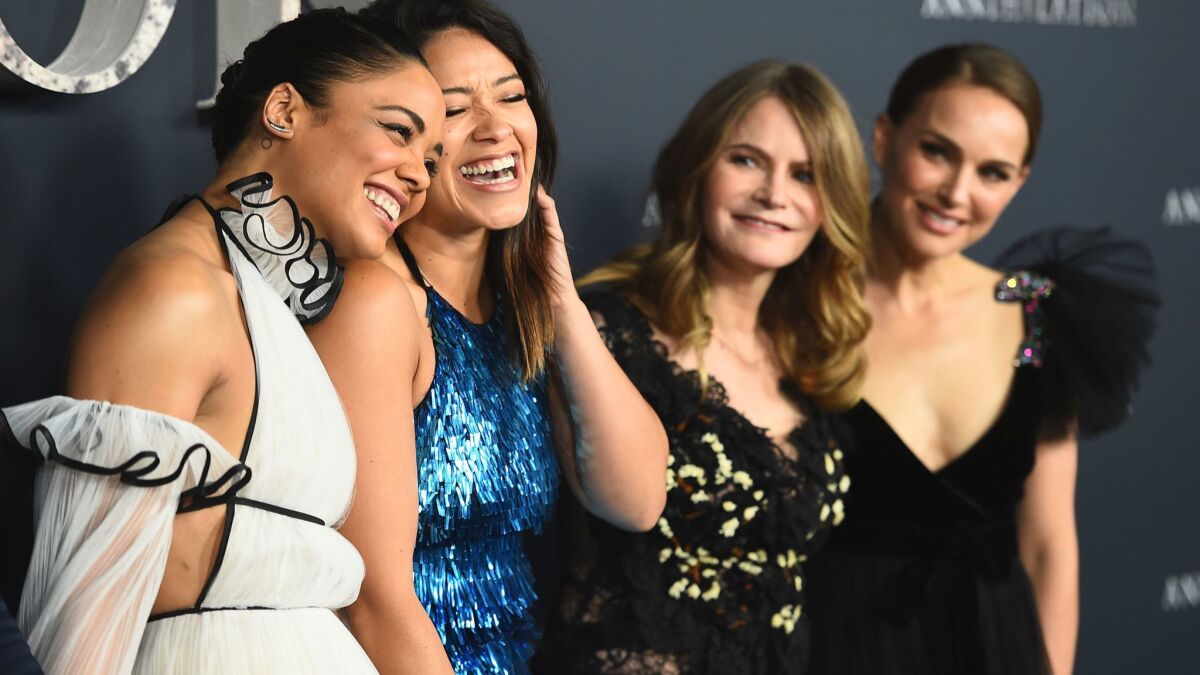 Tessa Thompson, left, Gina Rodriguez, Jennifer Jason Leigh and Natalie Portman arrive at the Los Angeles premiere of "Annihilation."