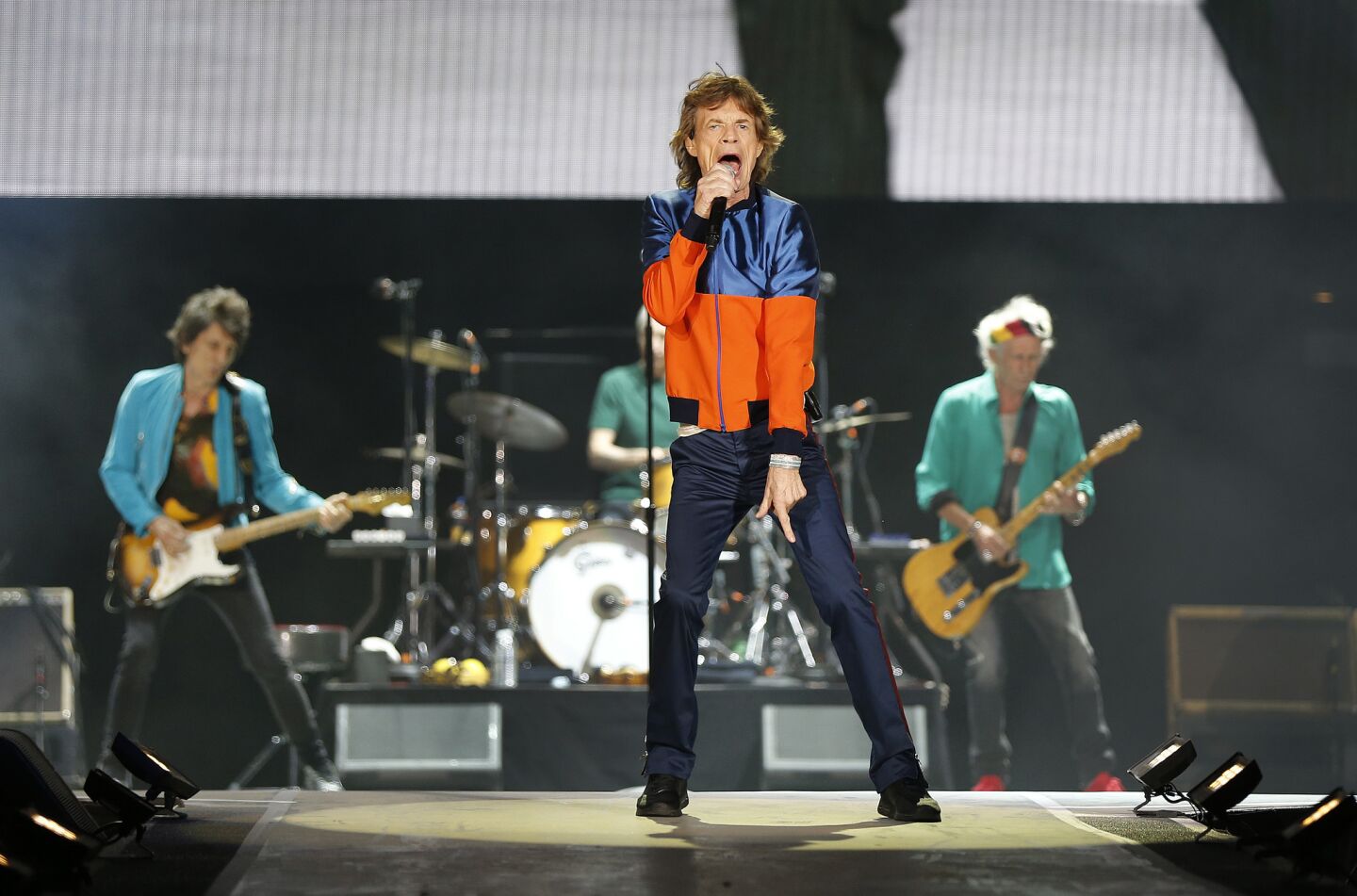 From left, Rolling Stones members Ronnie Wood, Charlie Watts, Mick Jagger and Keith Richards perform on the first day of the three-day Desert Trip at the Empire Polo Club grounds in Indio.
