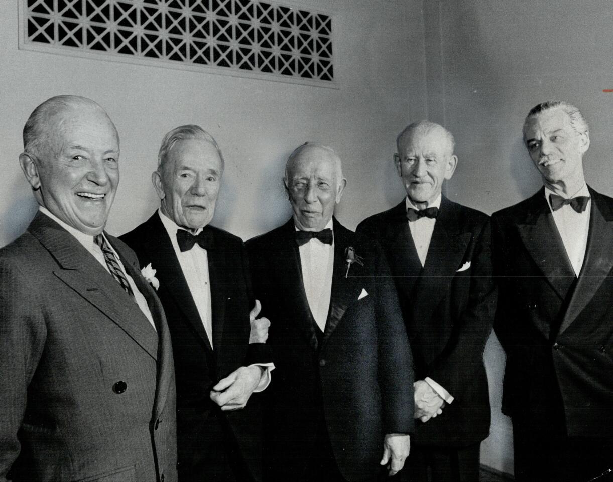 Some of the Group of Seven artists after a 1965 testimonial dinner in their honor: from left, Edwin Holgate; Fred Varley; A. Y. Jackson; A. J. Casson; and, representing his father, Lawren Harris Jr.