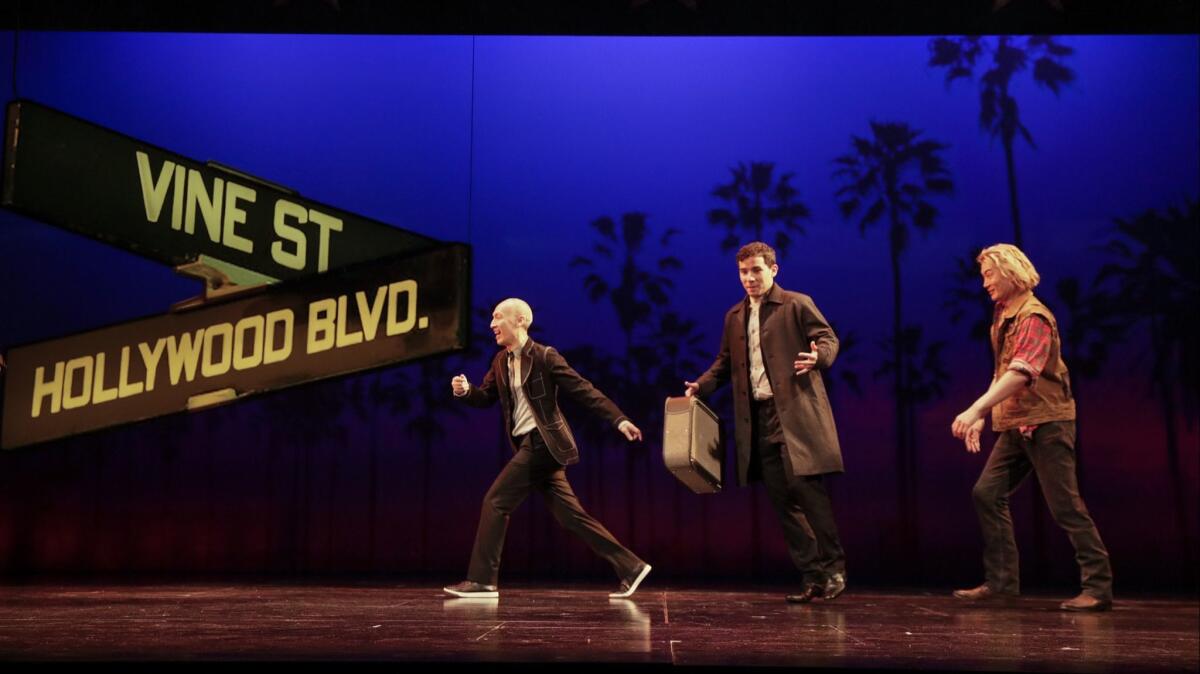 Francis Jue, left, Conrad Ricamora and Austin Ku during a run-through at the Ahmanson Theatre.