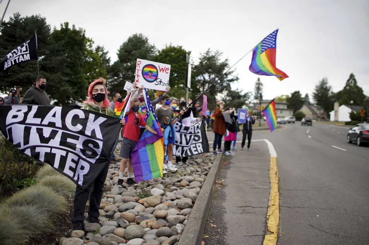 Protesters at Newberg School Board vote on banning Black Lives Matter and Pride flags at schools Sept. 28, 2021, in Oregon. 