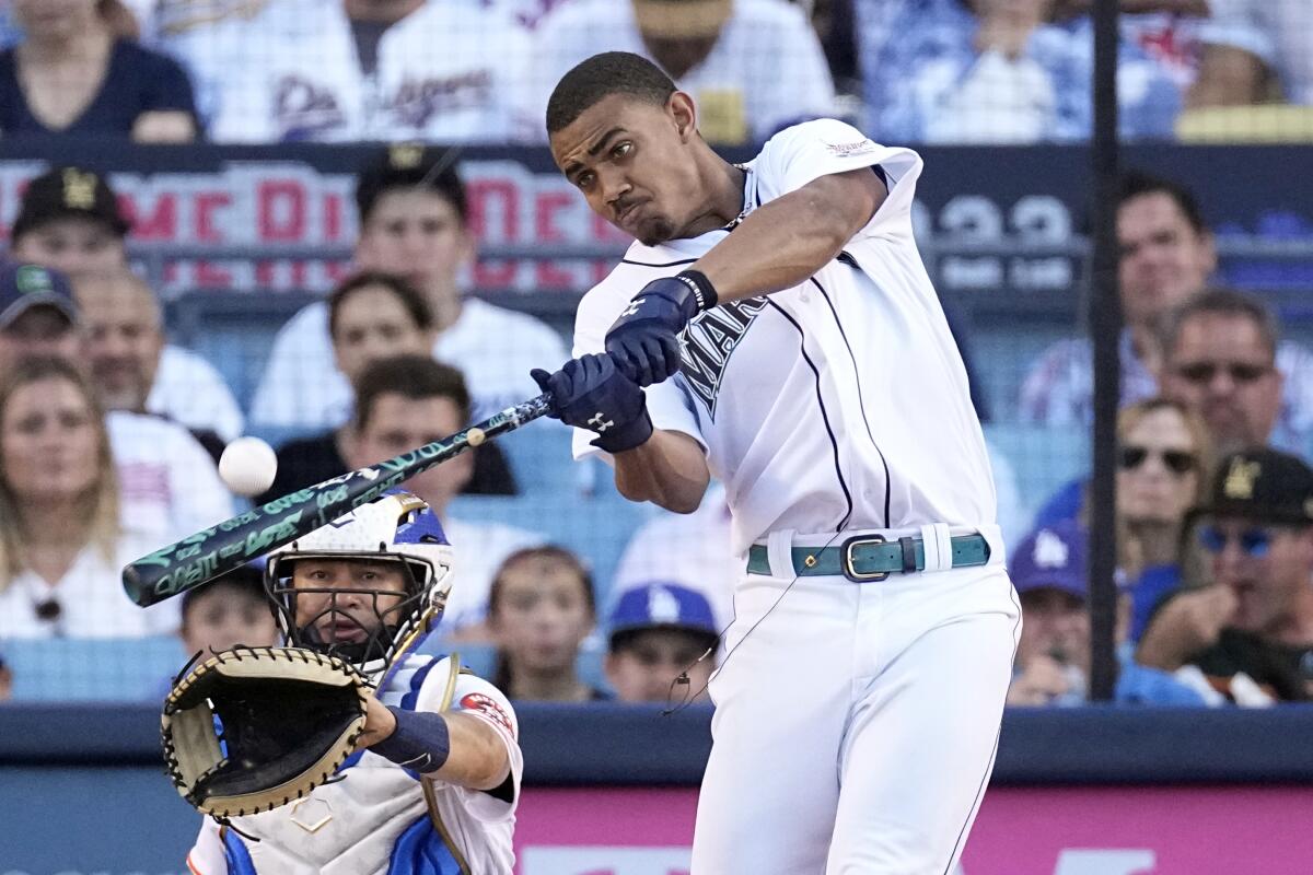 American League's Julio Rodriguez, of the Seattle Mariners, bats during the MLB All-Star baseball Home Run Derby, Monday, July 18, 2022, in Los Angeles. (AP Photo/Jae C. Hong)