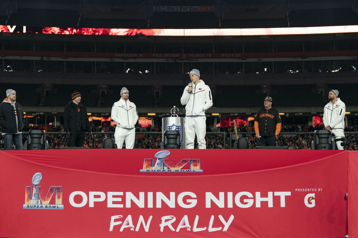 Cincinnati Bengals quarterback Joe Burrow speaks during the Super Bowl LVI Opening Night Fan Rally, Monday, Feb. 7, 2022, in Cincinnati. (AP Photo/Jeff Dean)