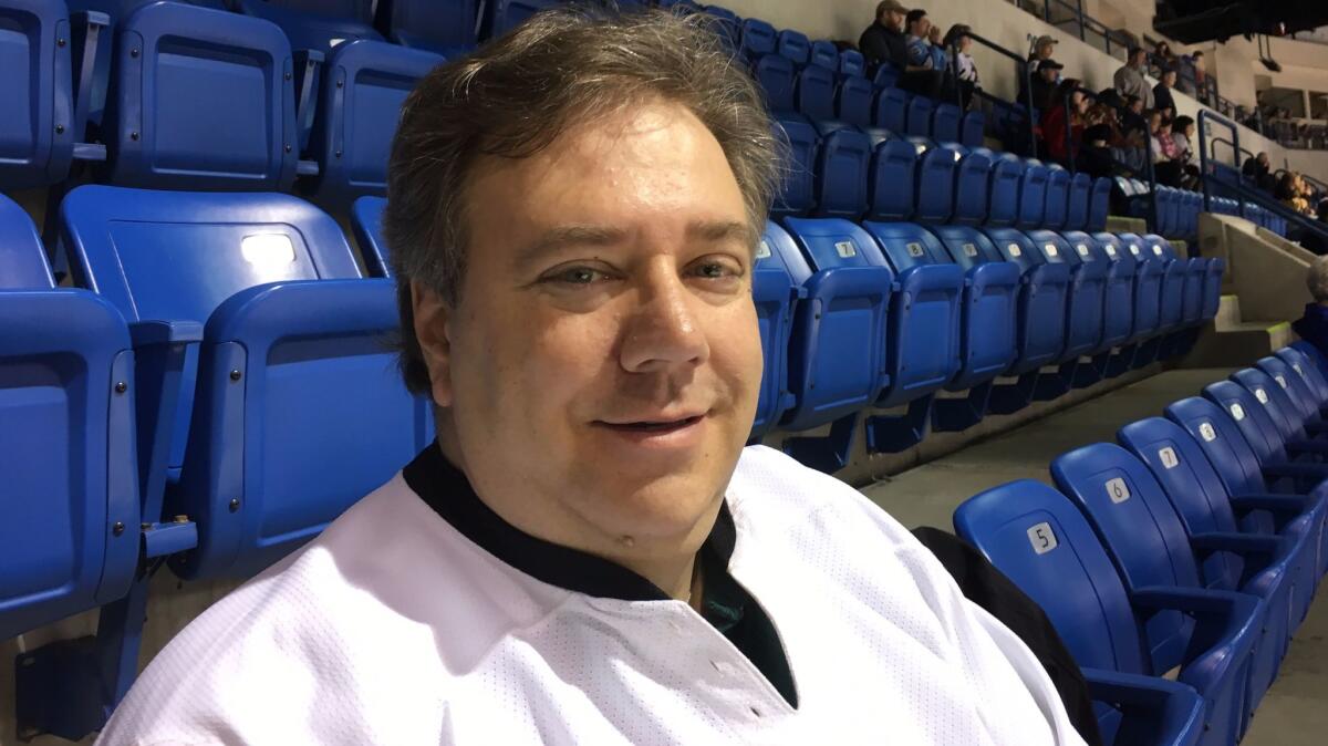 Trump supporter David Ambrulavage attends a minor league hockey game at the Mohegan Sun Arena — where Donald Trump held a rally during the election — in Wilkes-Barre, Pa.