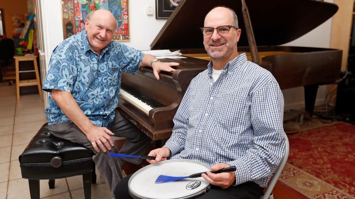 Musicians John Ferraro, right, and Mark Davidson will perform with the Mark Davidson Trio on Nov. 19 in Huntington Beach.