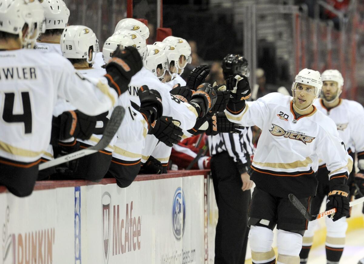 Ducks center Andrew Cogliano, right, is congratulated by his teammates after scoring a goal against the Washington Capitals on Monday. Cogliano has 11 goals and 22 points this season.