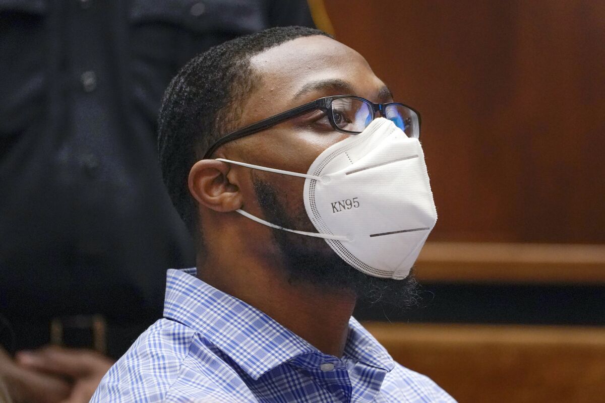 Khalil Wheeler-Weaver, 25, listens to his sentence in a courtroom in Newark, N.J., Wednesday, Oct. 6, 2021. Wheeler-Weaver, who used dating apps to lure and kill three women five years ago, was sentenced Wednesday to 160 years in prison after a trial in which it was revealed that friends of one victim did their own detective work on social media to ferret out the suspect. (AP Photo/Seth Wenig, Pool)