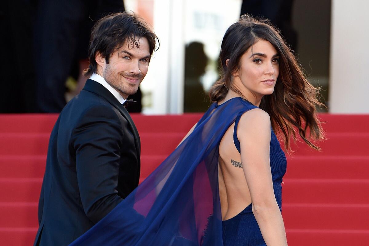 Newlywed actors Ian Somerhalder and Nikki Reed make their way down the 68th Cannes Film Festival red carpet as man and wife.